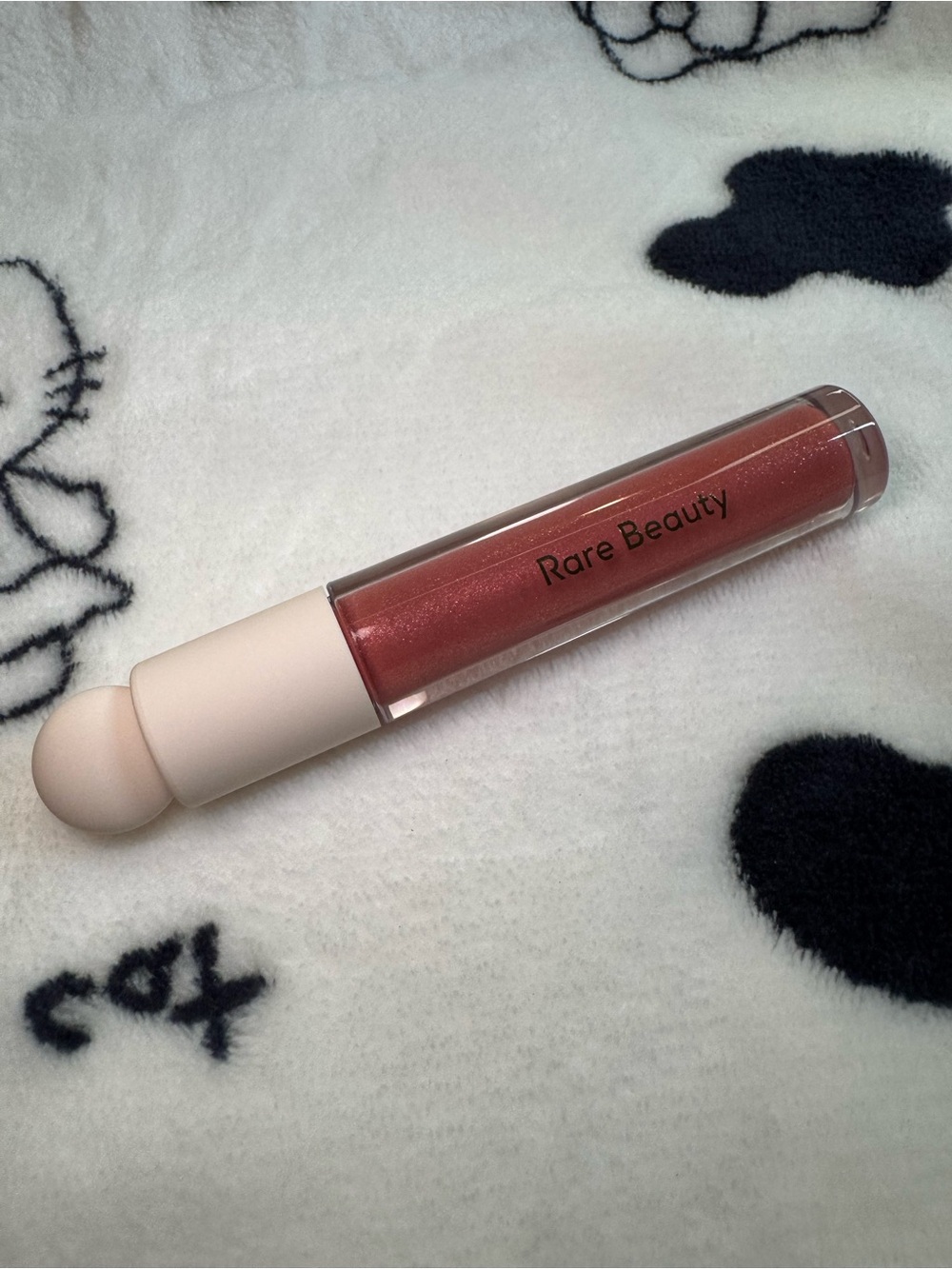 Rare Beauty Positive Light Luminizing Lip Gloss in Glimmer
